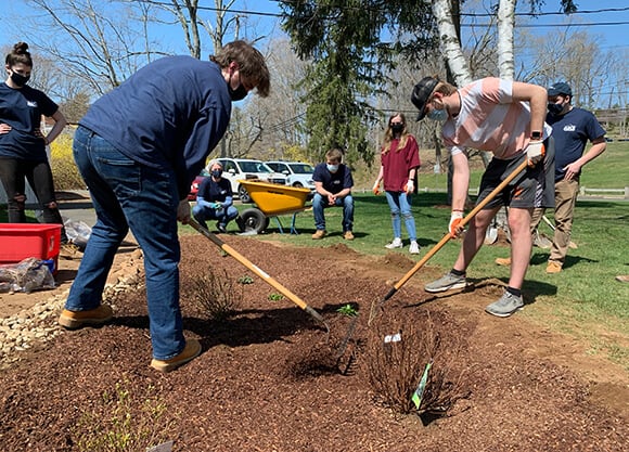 Students work on a garden.