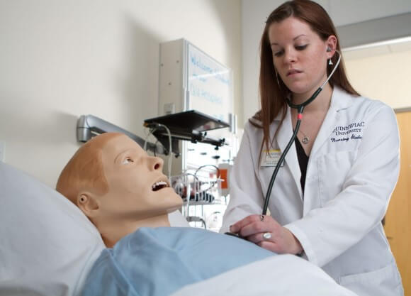 Nursing student in the clinical simulation lab at the Quinnipiac School of Health Sciences