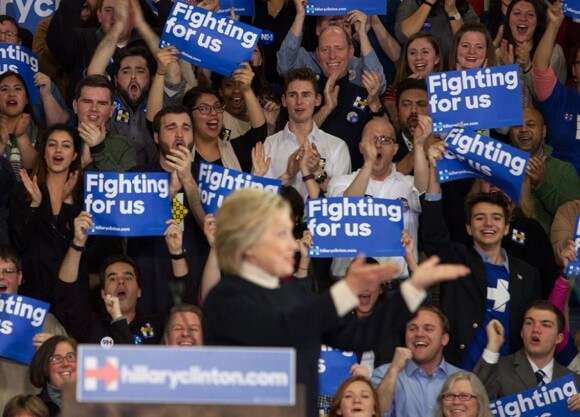 Quinnipiac students and professor cheer behind Hillary Clinton during New Hampshire primary