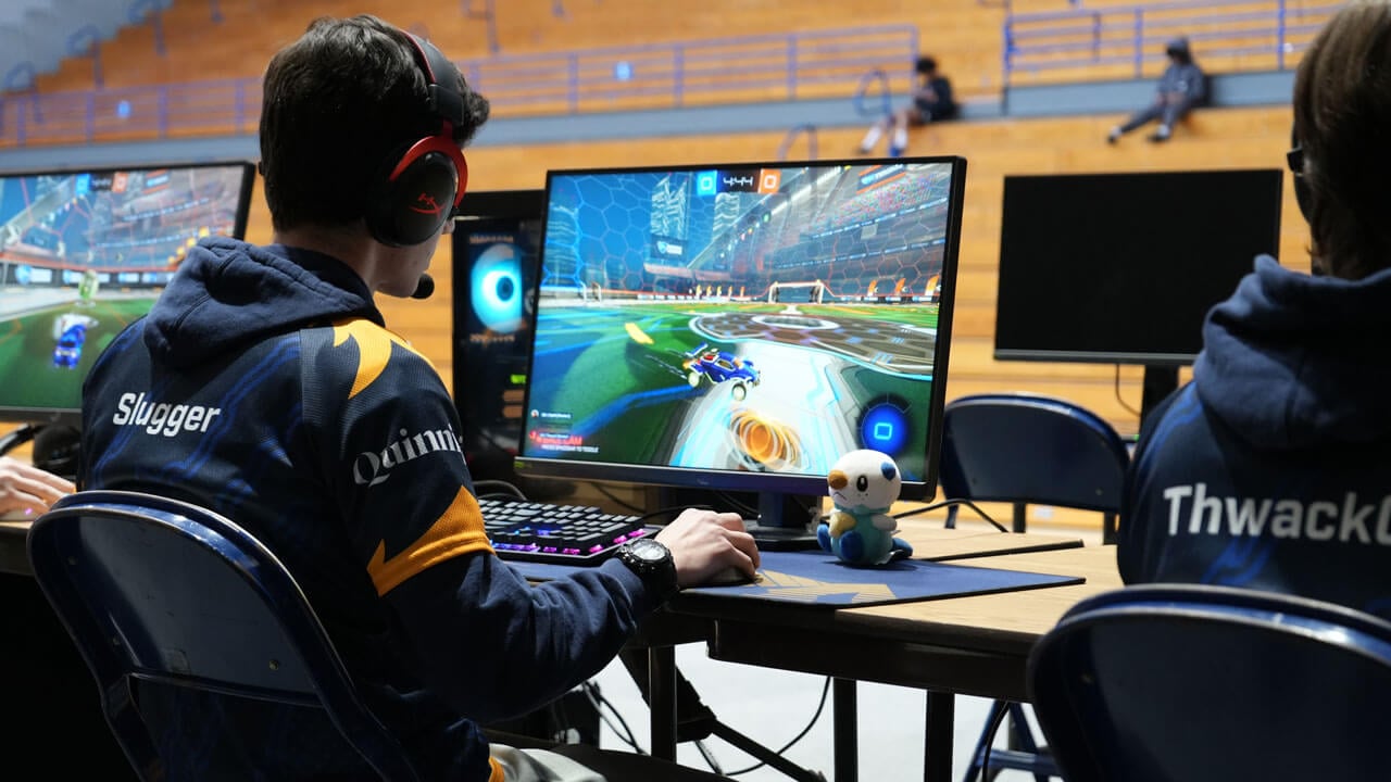 Quinnipiac Esports member on his computer