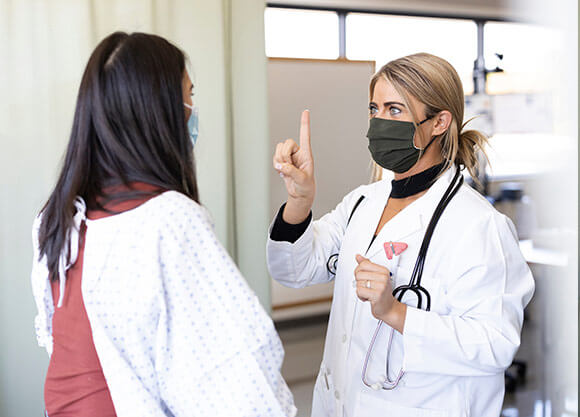 nurse examining patient