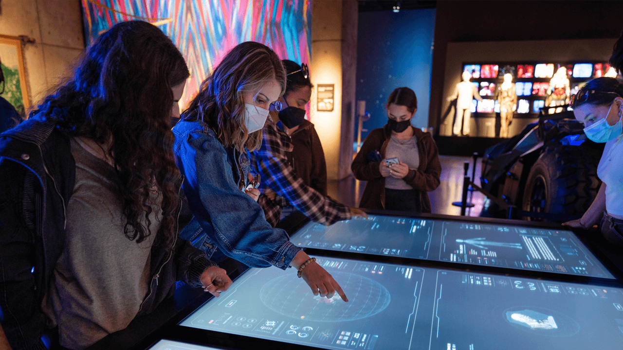 Students use touchscreens at Warner Bros in LA