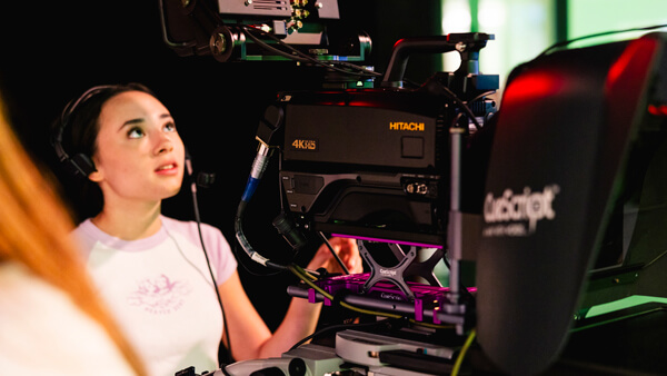 Student using the cameras in the McMahon Center