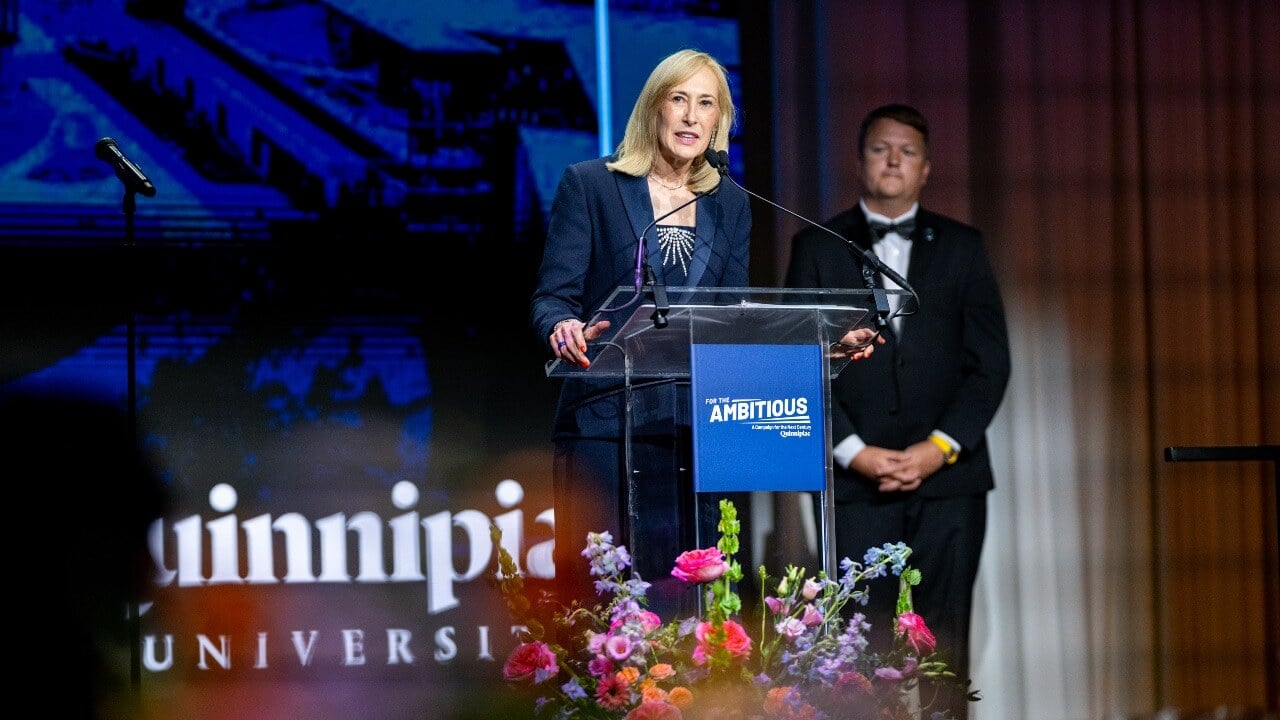 Speaker at the podium at Quinnipiac Gala