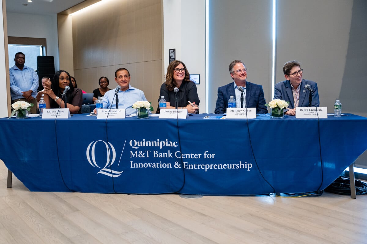 Judges listen to presenters