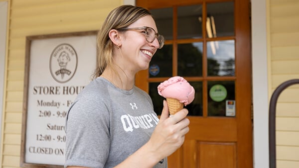 Student enjoying ice cream at a local creamery
