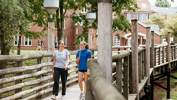 Students walking along the Commons Bridge