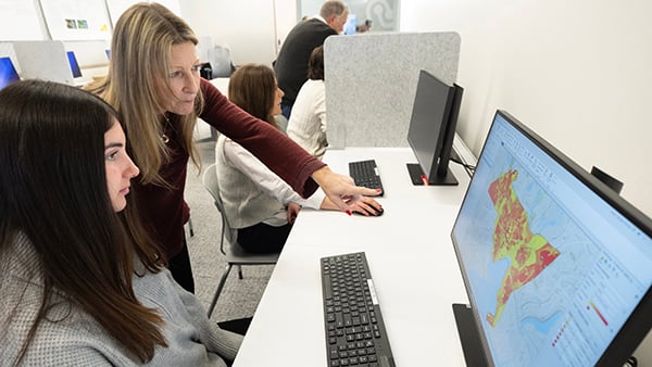 Student and professor collaborating on a project