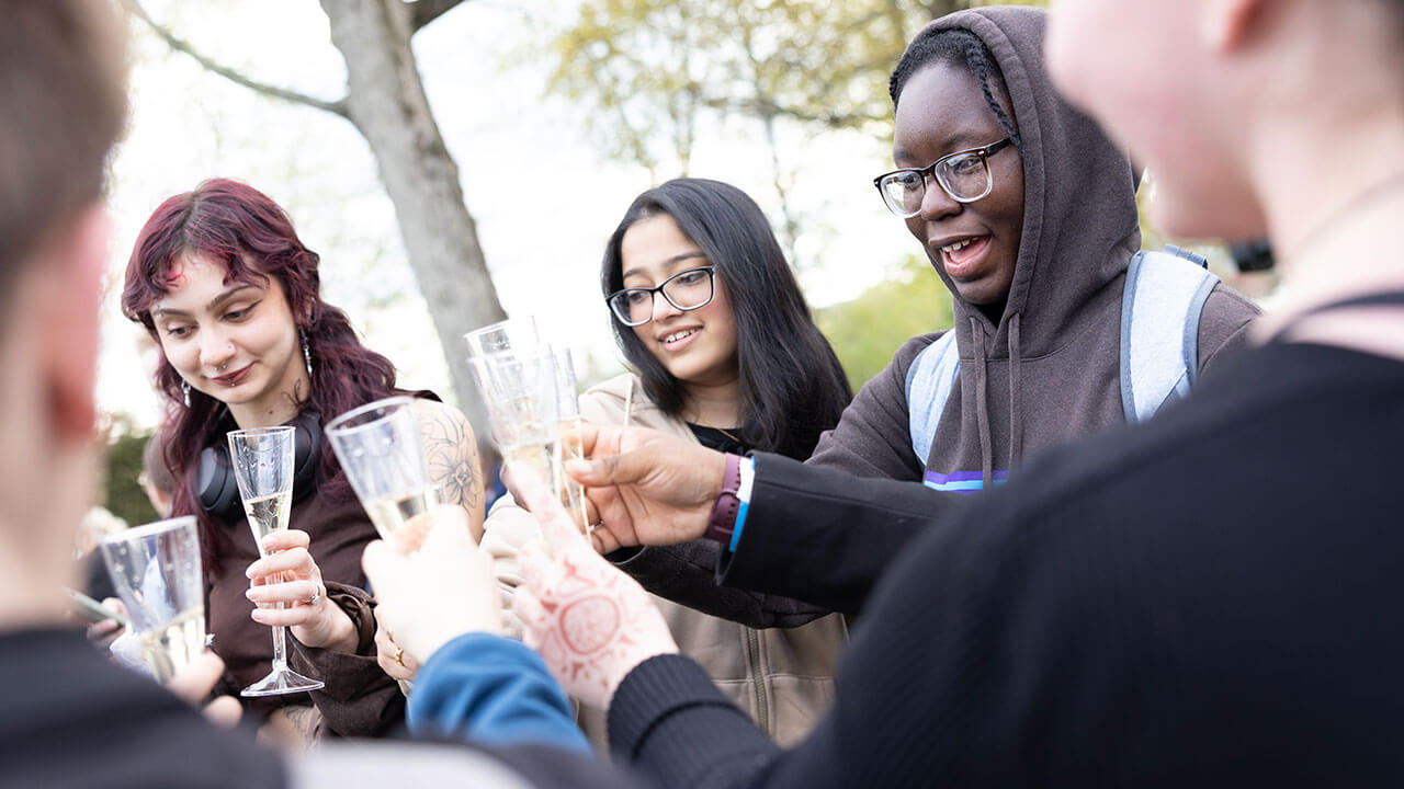 Students from the Class of 2023 raise a toast