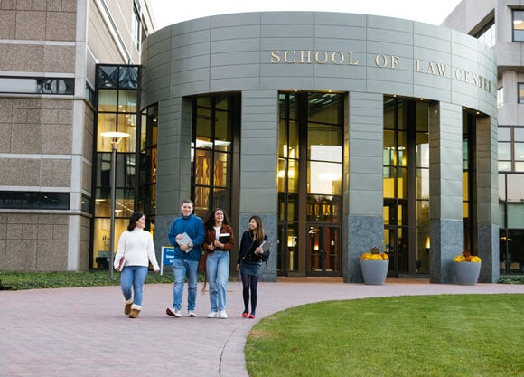 Students walkinig out of the School of Law on the North Haven Campus.