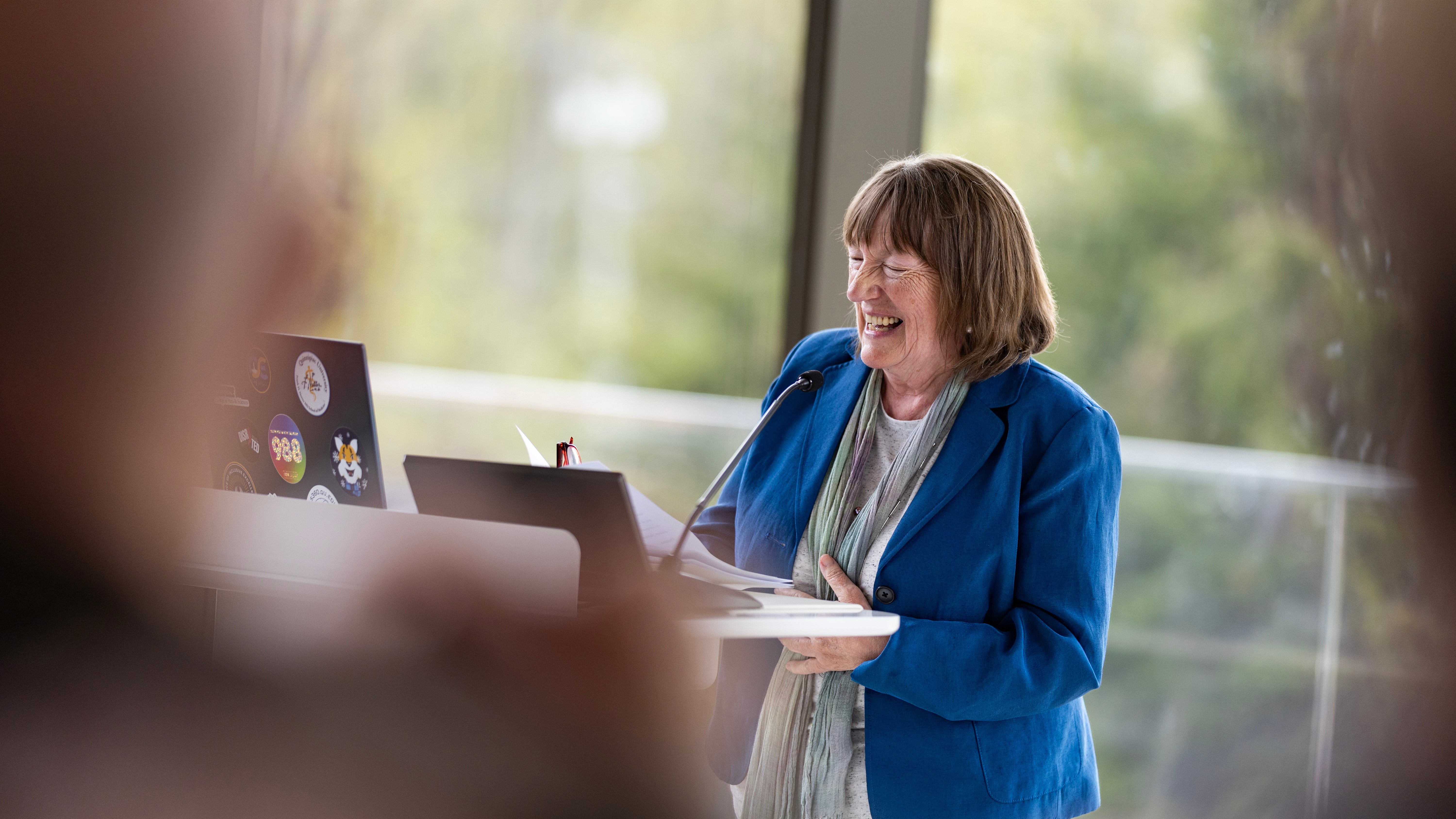 Speaker laughs at the Quinnipiac Faculty Awards