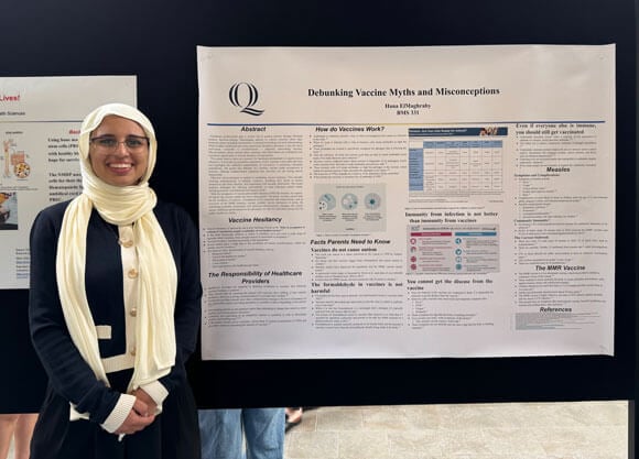 Headshot of a student next to a research poster.