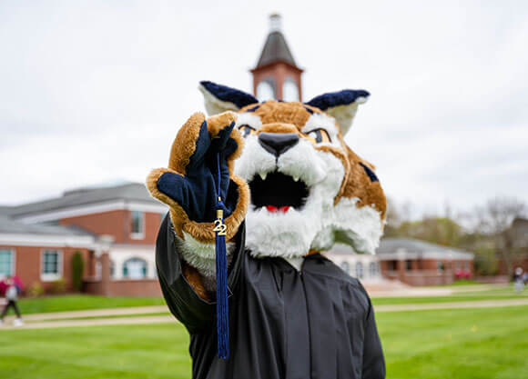 Boomer in a cap and gown