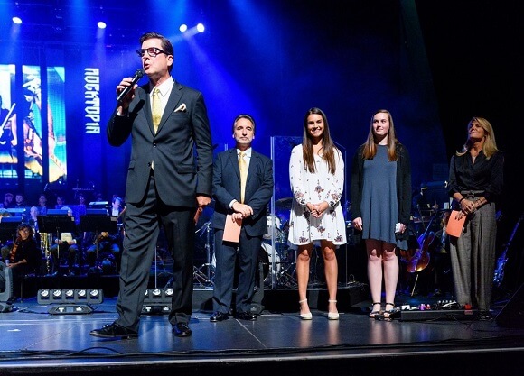 Scholarship recipients on stage before a ROCKTOPIA concert during Parents and Family Weekend 2017.