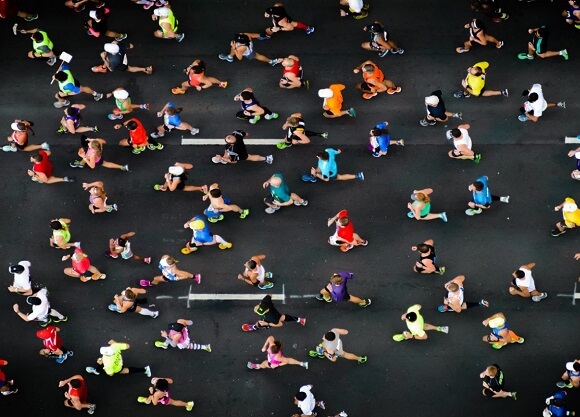 Overhead view of runners participating in a marathon.