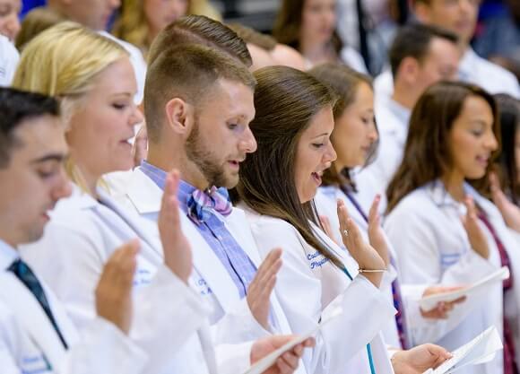 Fifty physician assistant graduates were awarded certificates and white coats.