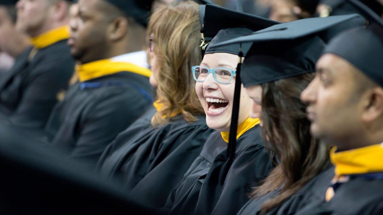 The university community conferred 985 graduate degrees on Saturday, May 13.