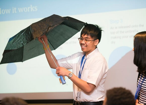 Tucksinh Sysavat, a student with Connecticut Center for Arts and Technology, speaks to crowd.