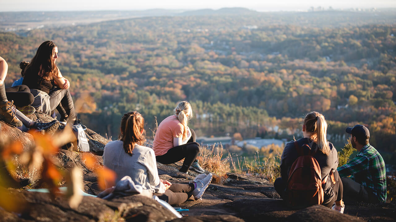 Students enjoy the view of Quinnipiac from the top of Sleeping Giant.