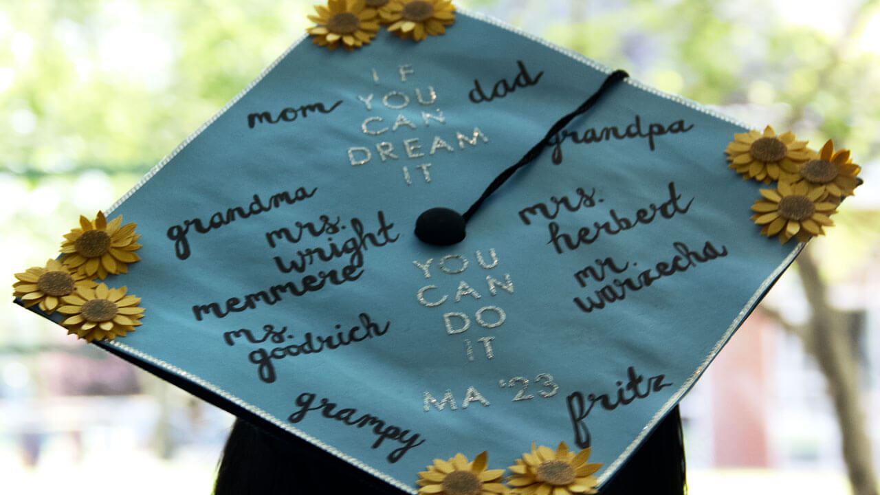 Graduation cap decorated in light blue 