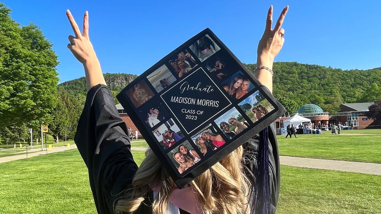 Graduate has photos pasted on cap of her experience at Quinnipiac