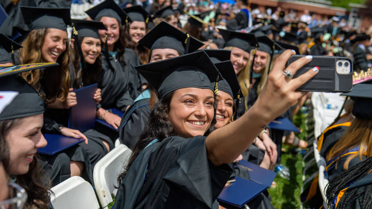 Graduating students take selfie