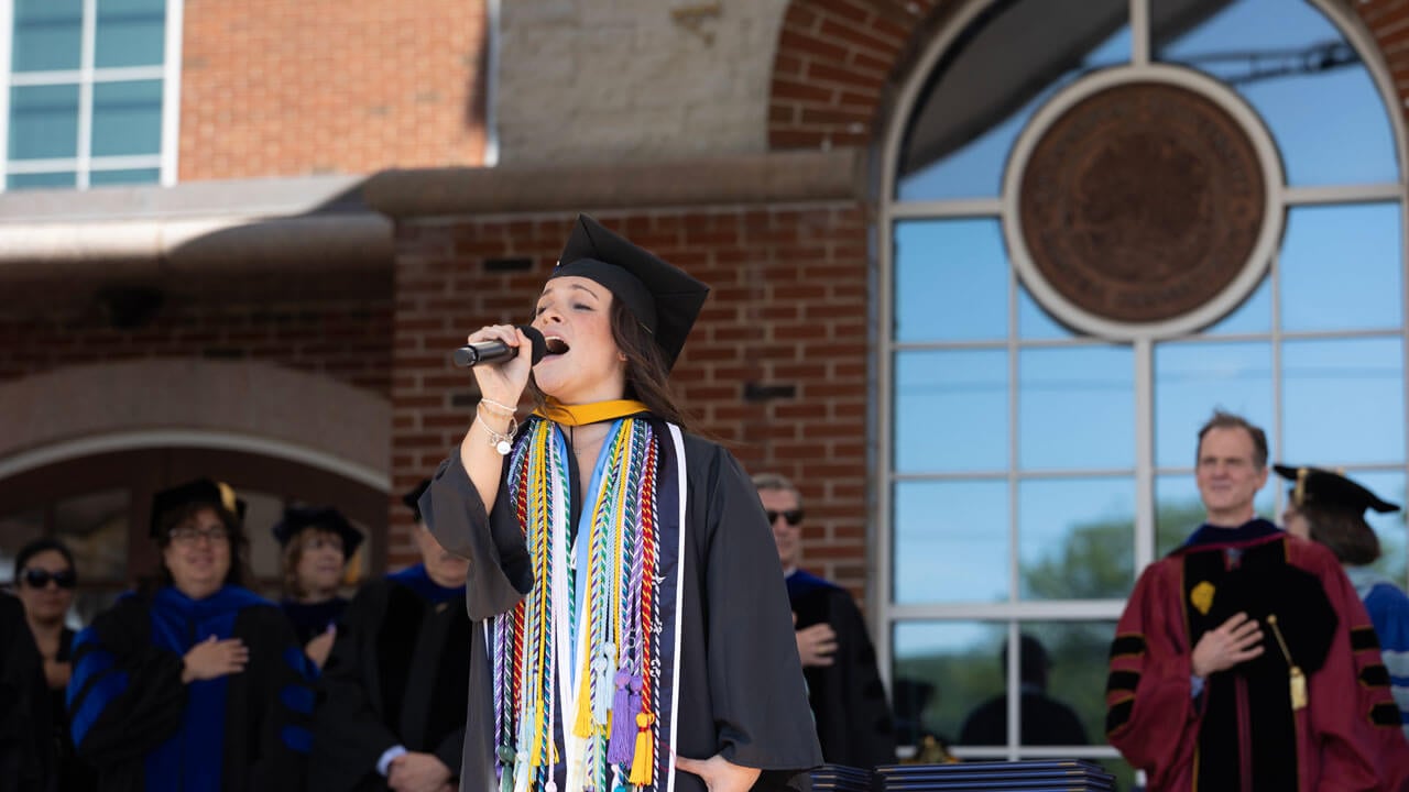 Mia Calore '23 performed the national anthem on stage to start commencement