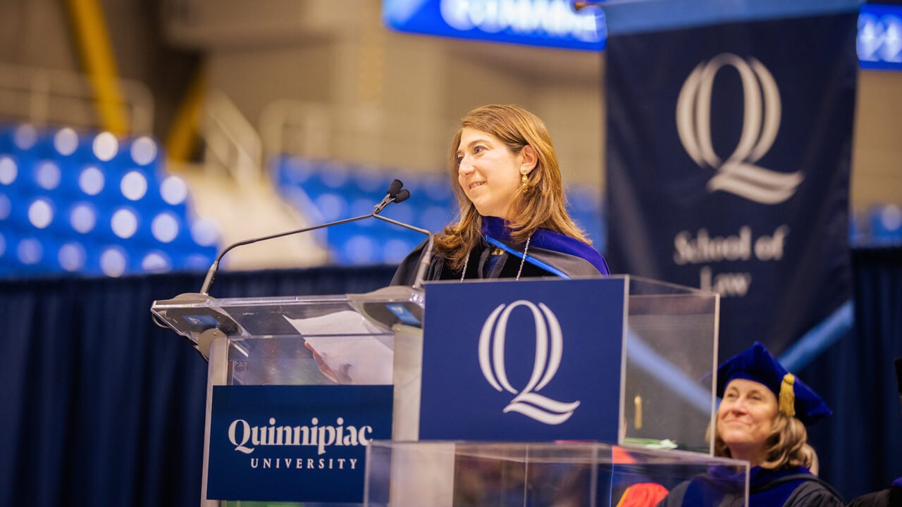 Jennifer Levine delivers her professor of the year remarks from the podium