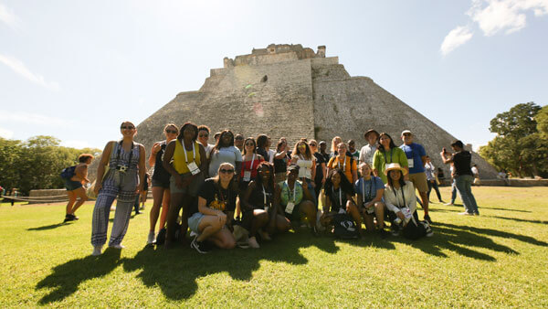 Students take a group photo on their Uxmal trip.