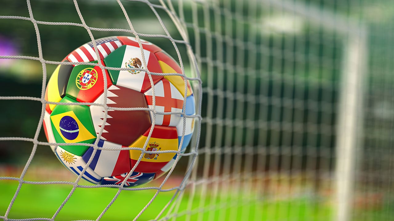 Stock image of the Fifa World Cup soccer ball in a net