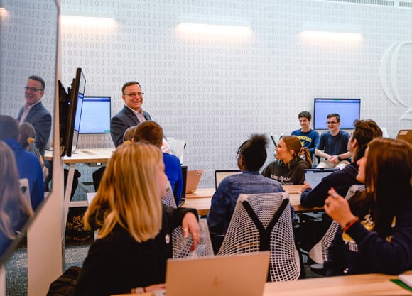 A male professor teaching an engineering class