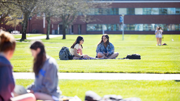 Students sitting on the quad