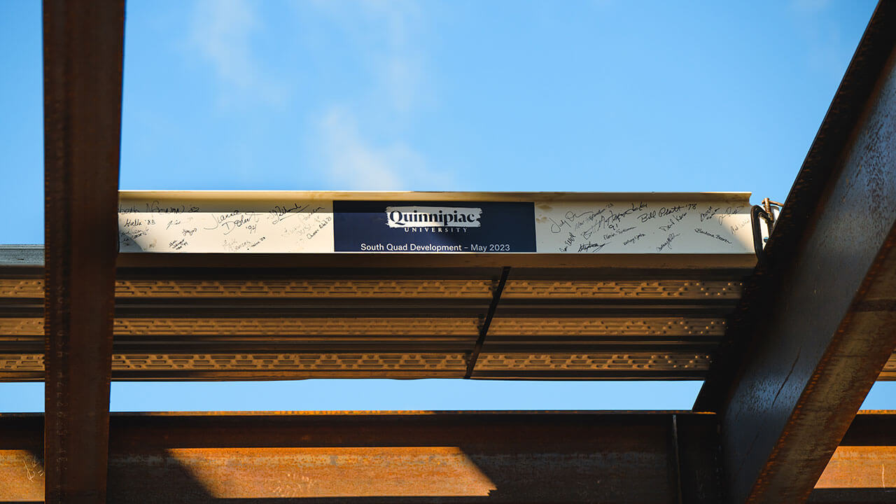 A signed beam is built into the structure of the new South Quad buildings