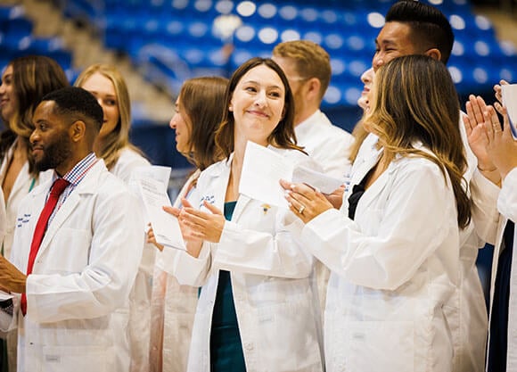 Physician Assistant class of ’22 celebrated as they slipped on their long white coats