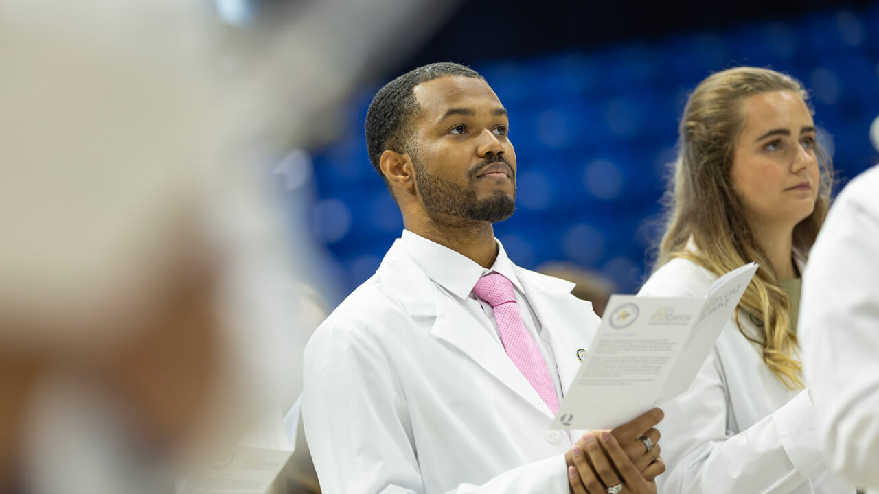 Person reads from paper