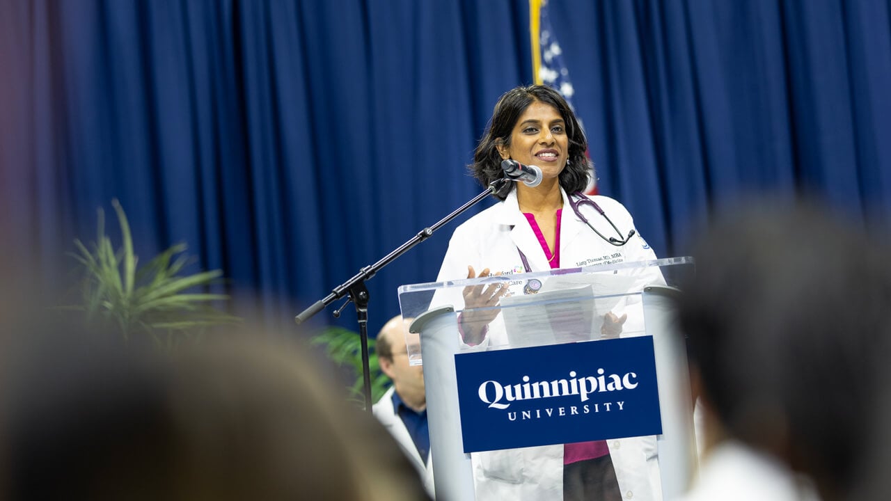 Person speaks at a podium