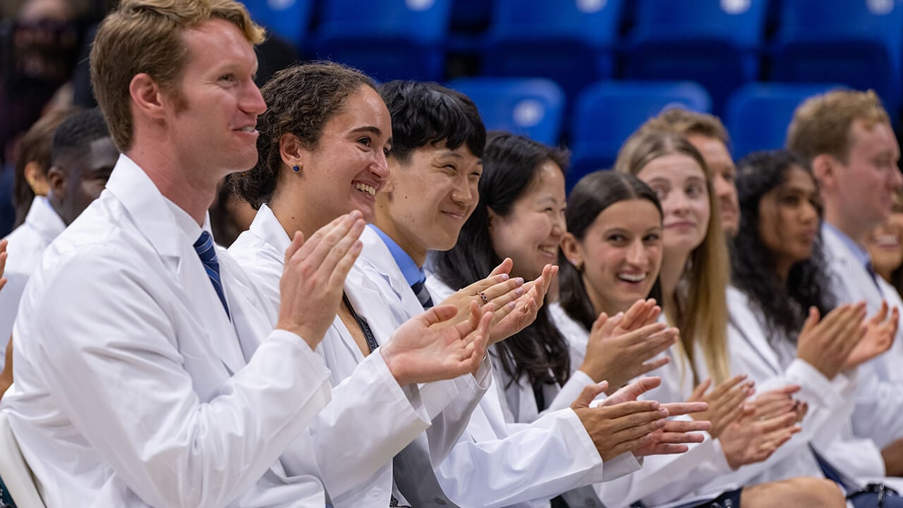 Students clapping