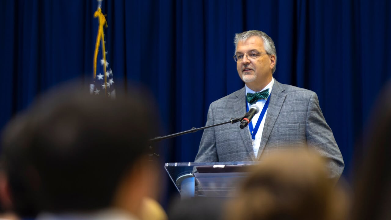Person speaks at a podium