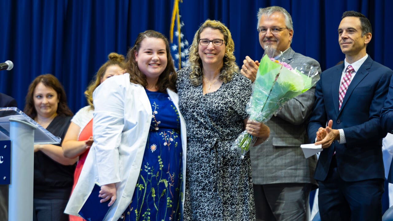 People pose for a photo
