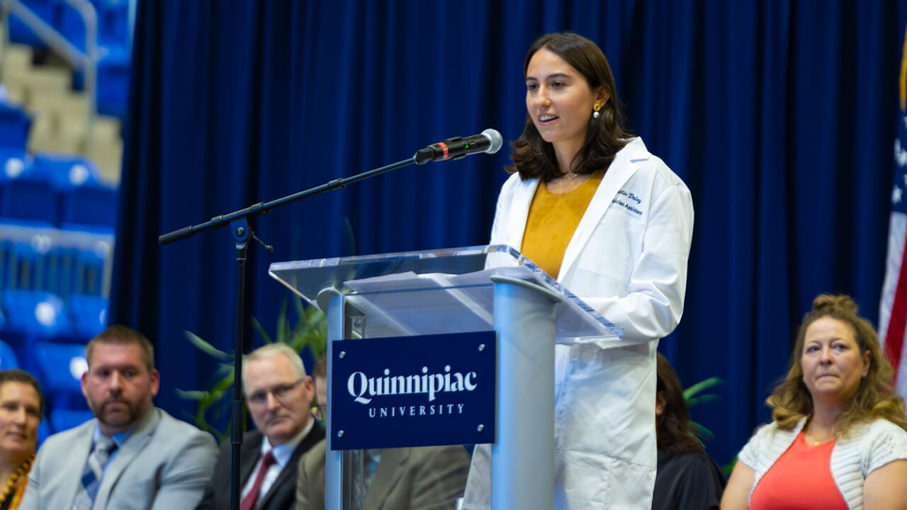 Person speaks at a podium