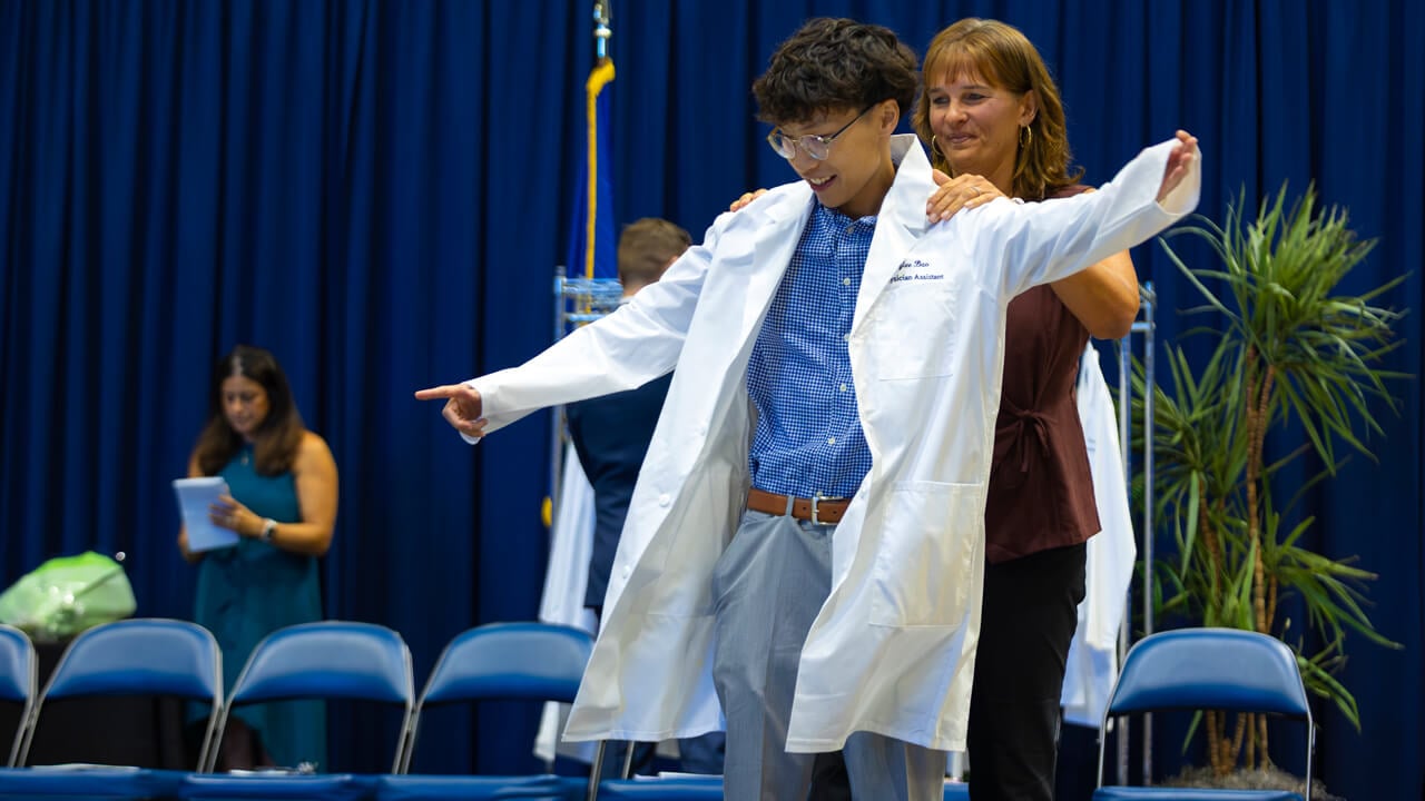 Student receives their white coat
