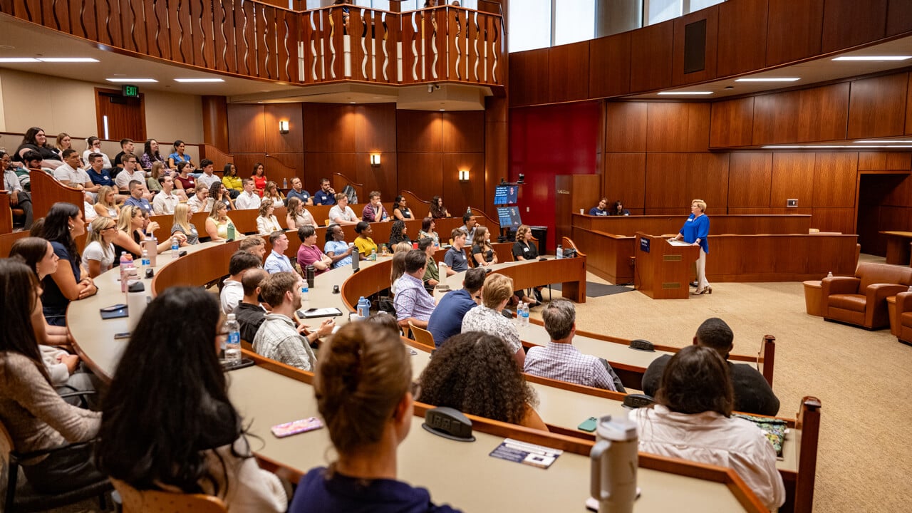 People sitting in a courtroom