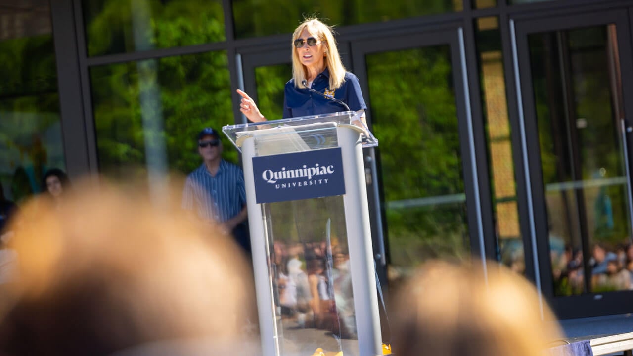President Marie Hardin speaks to the class of '29