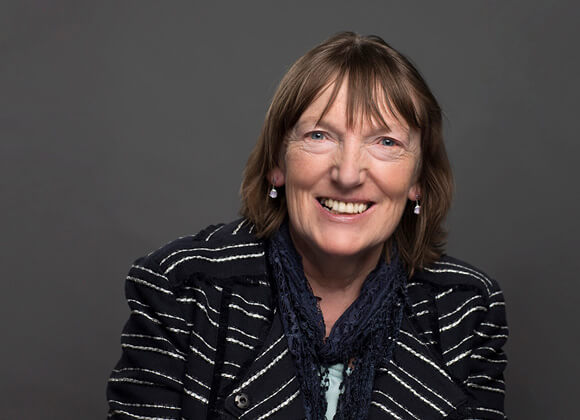 Headshot of professor Christine Kinealy smiling.