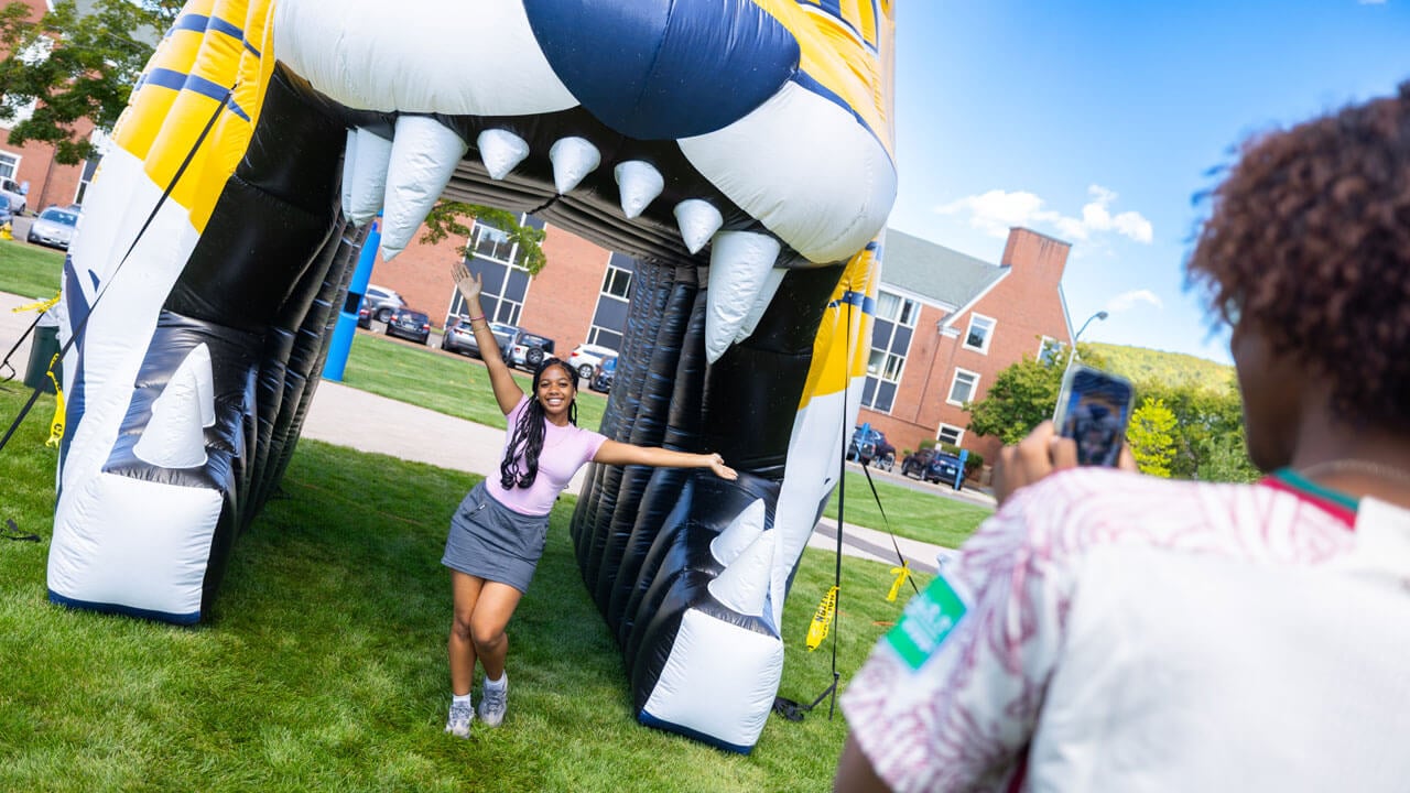 Student poses with inflatable bobcat
