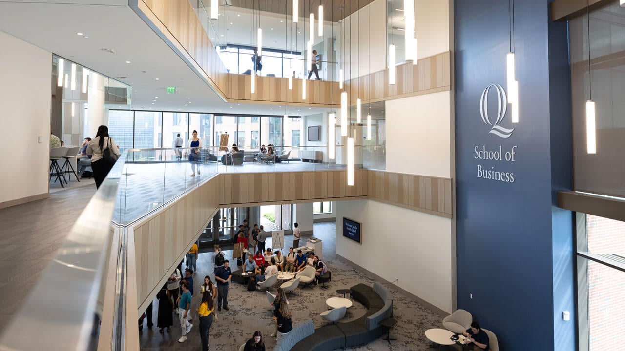 Students gather inside the new buildings