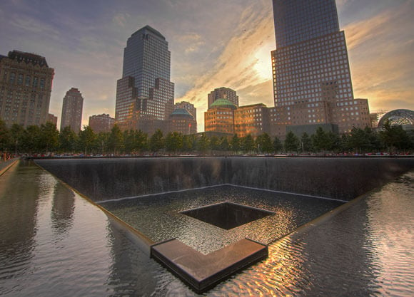 The reflecting pool and skyline of NY at the 9/11 memorial