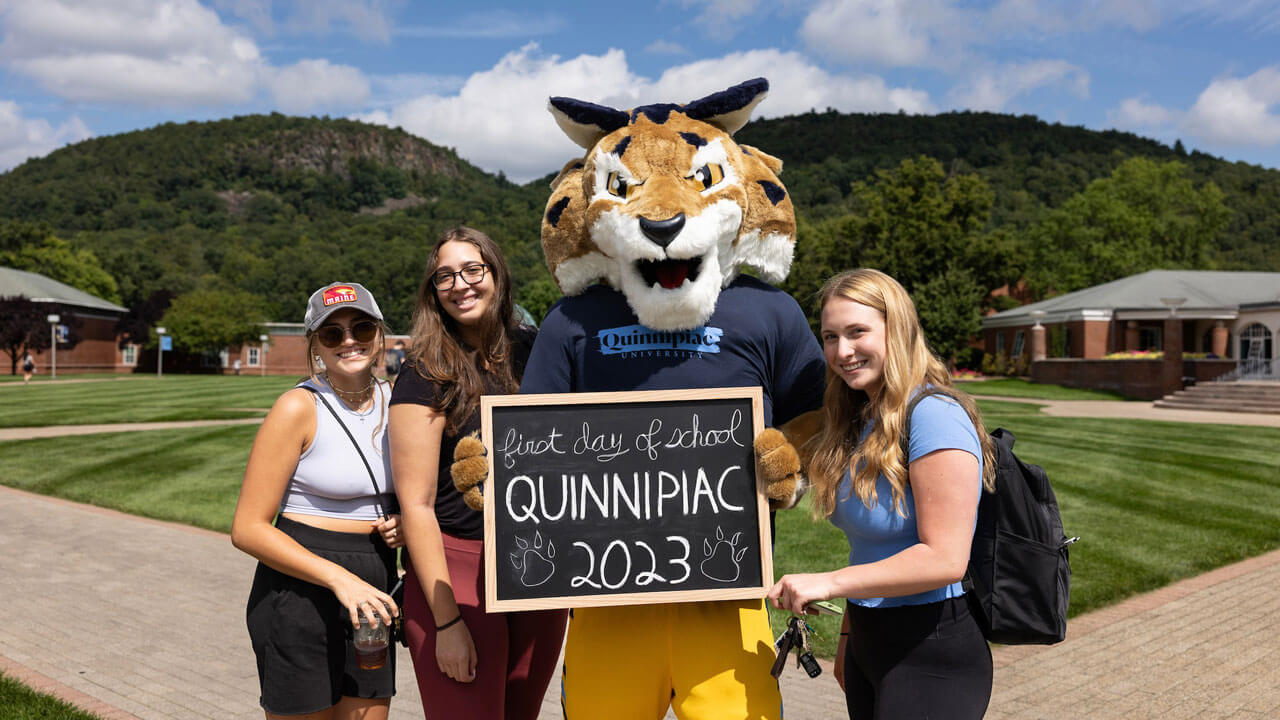 Students capture their first day of classes with a photo with Boomer