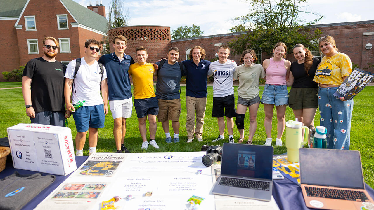Quinnipiac Chronicle members pose for a photo together