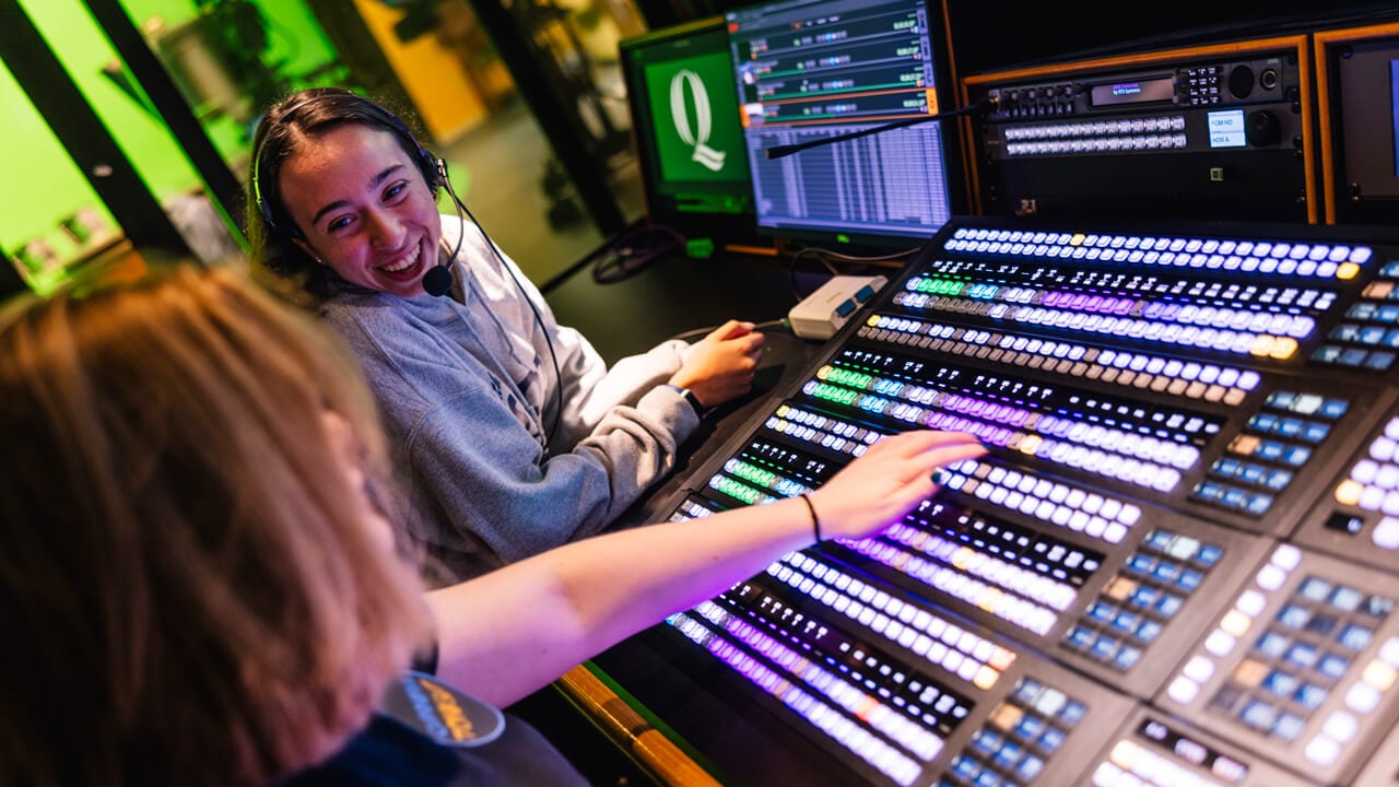 Student at the control panel in the McMahon Center